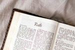 Open Bible showing the book of Ruth, symbolizing Naomi’s story of grief and God’s redemption. Ruth Bible study